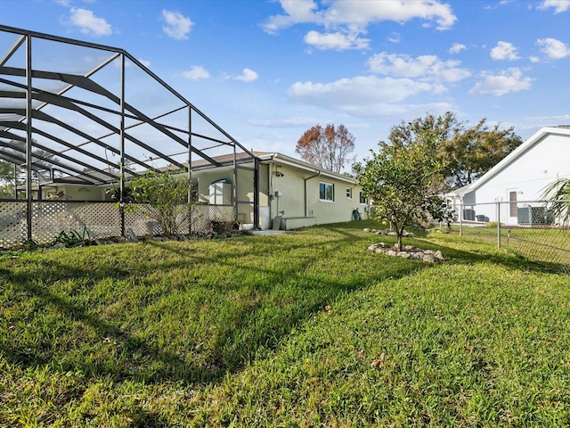 view of yard featuring a lanai