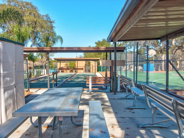 view of patio / terrace with basketball court and tennis court