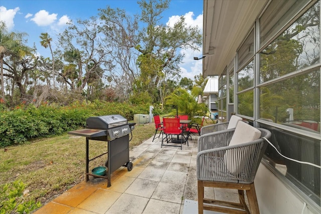 view of patio featuring a grill