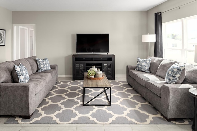 living room with tile patterned floors