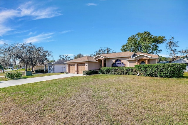 ranch-style home with a front yard and a garage