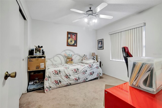 bedroom with carpet and ceiling fan