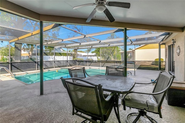 view of patio / terrace with a fenced in pool, ceiling fan, and a lanai