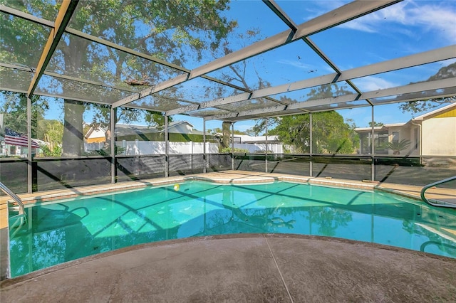 view of pool with a lanai