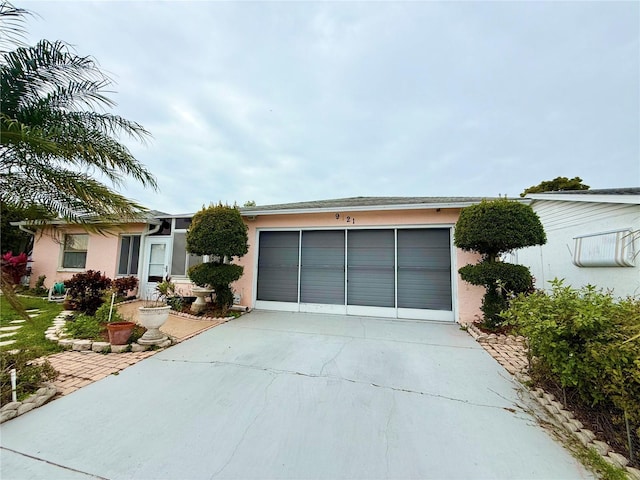 single story home with a garage