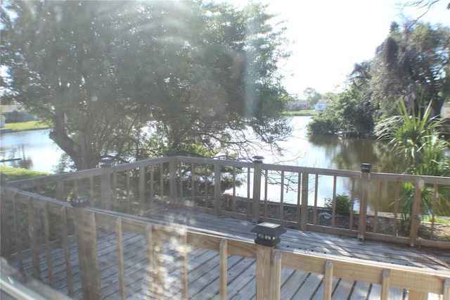 deck featuring a water view