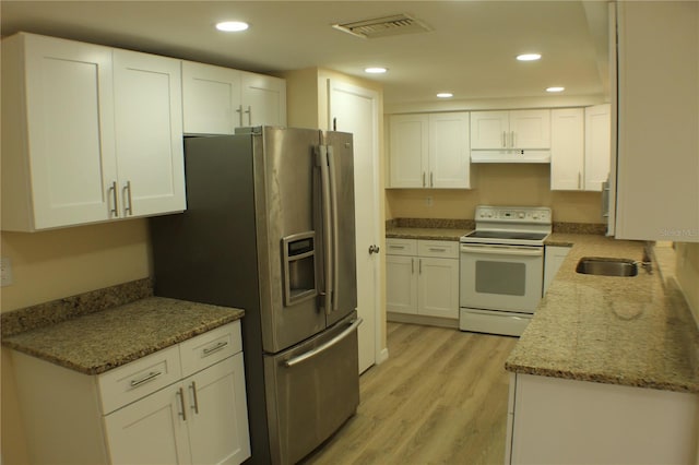 kitchen featuring white cabinetry, sink, stainless steel fridge with ice dispenser, white range with electric stovetop, and light hardwood / wood-style floors