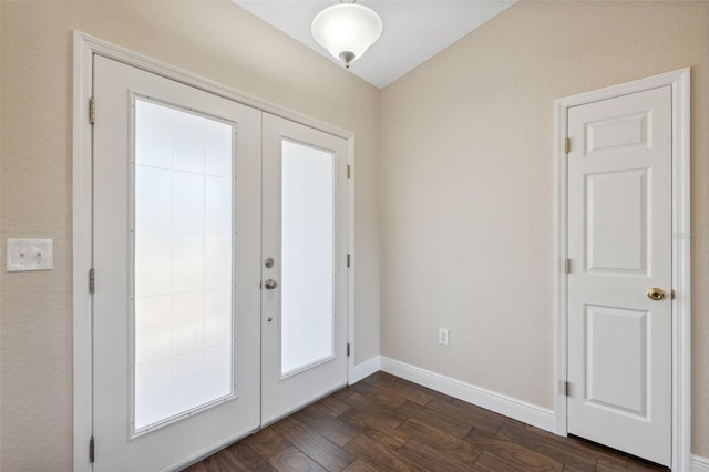 entryway featuring french doors and dark wood-type flooring