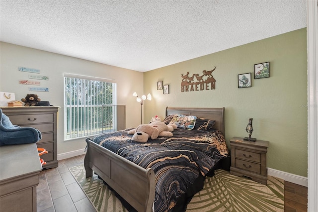 bedroom with a textured ceiling