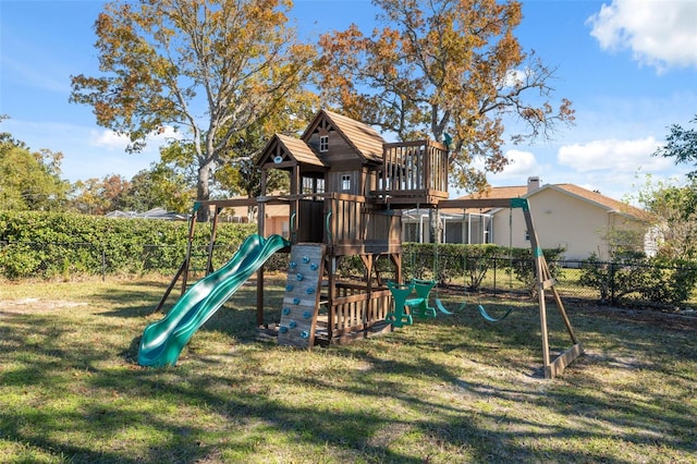 view of play area featuring a lawn