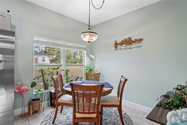 dining room featuring light tile patterned flooring