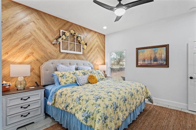 tiled bedroom with ceiling fan