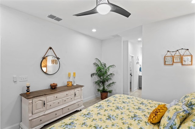 tiled bedroom with ceiling fan