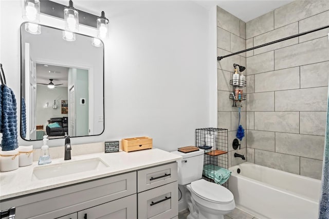 full bathroom with shower / bath combination with curtain, vanity, toilet, and ceiling fan