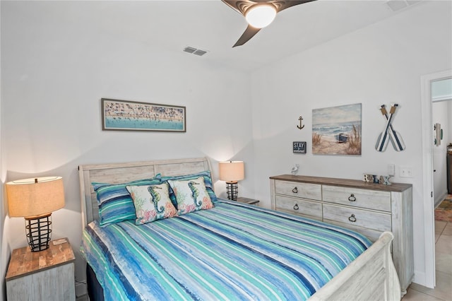 bedroom featuring ceiling fan and light tile patterned floors