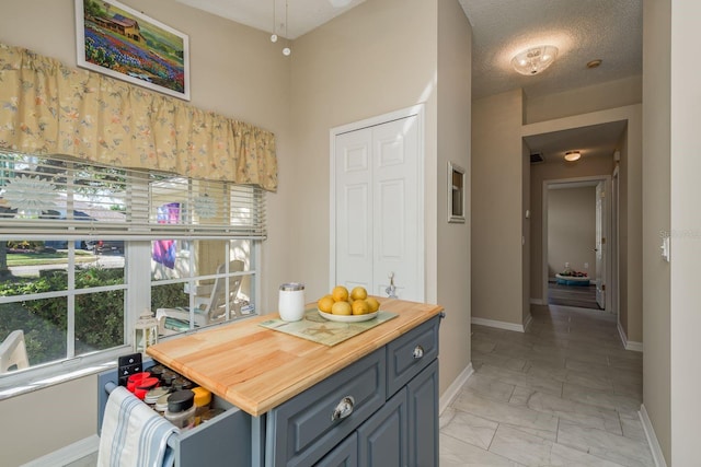 kitchen with a textured ceiling