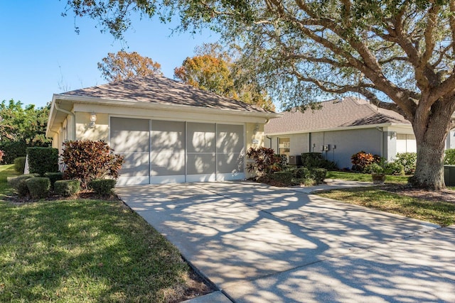 single story home featuring a front yard