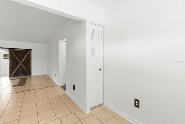 interior space with light tile patterned floors