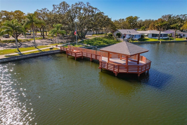 dock area featuring a gazebo and a water view