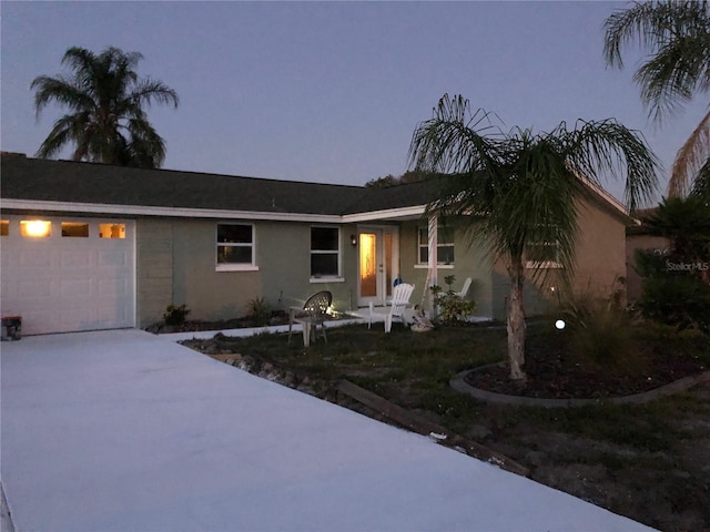 view of front of home with a garage