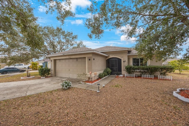 ranch-style home featuring a garage