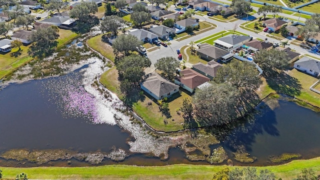 drone / aerial view with a water view