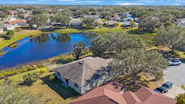 drone / aerial view with a water view