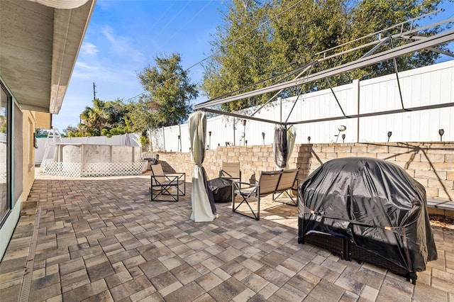 view of patio with area for grilling