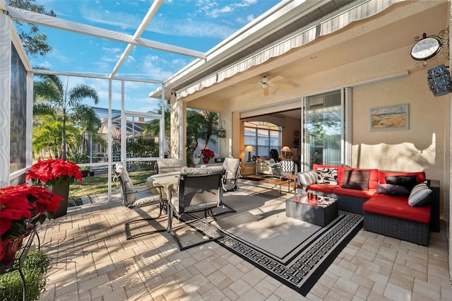 view of patio featuring an outdoor living space and a lanai