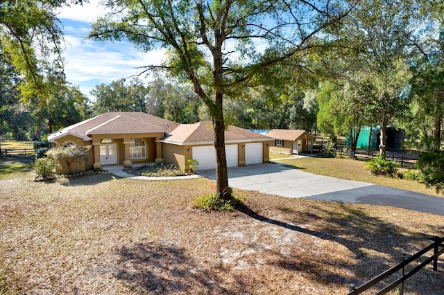 ranch-style house with a garage