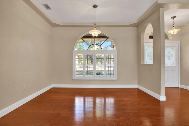 unfurnished room with hardwood / wood-style floors