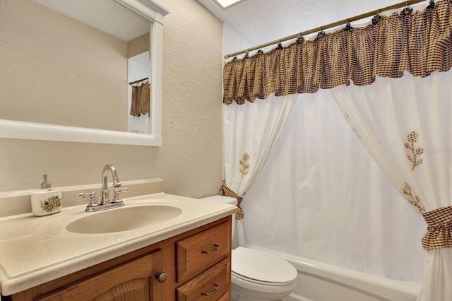 full bathroom featuring toilet, vanity, and shower / bath combination with curtain