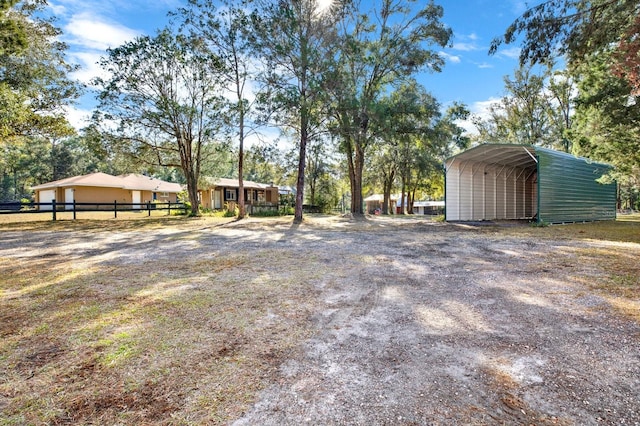 view of yard featuring a carport