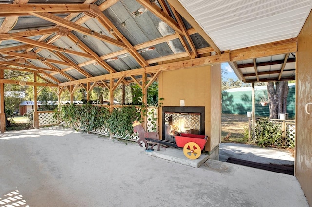 view of patio / terrace with an outdoor fireplace