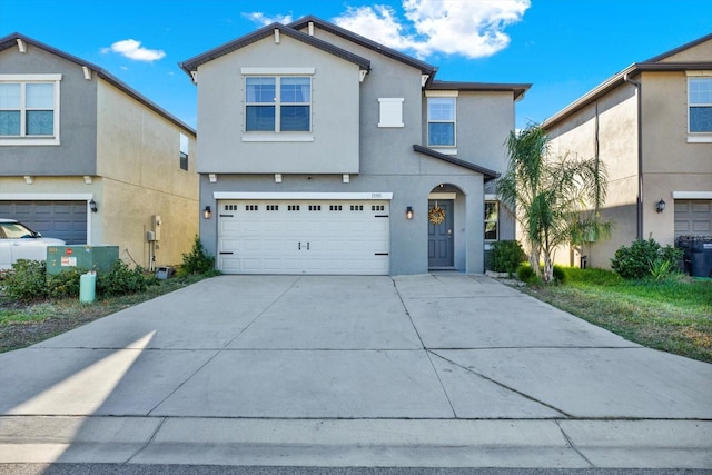 view of front of property featuring a garage