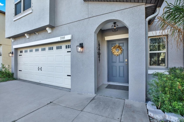 property entrance featuring a garage