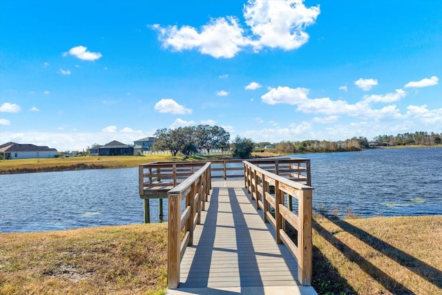 dock area featuring a water view