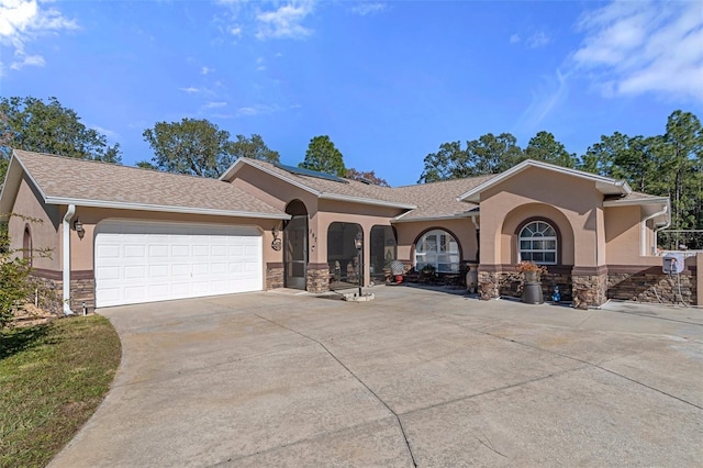 view of front of house with a garage