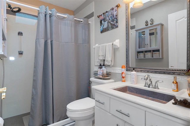 bathroom with walk in shower, vanity, and toilet