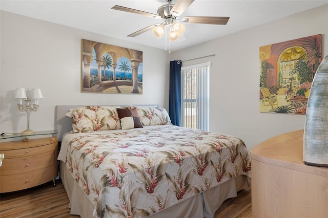 bedroom featuring ceiling fan and hardwood / wood-style floors