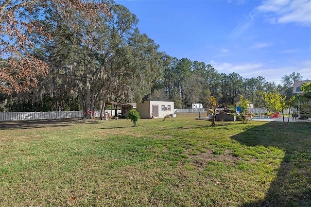 view of yard with a storage shed