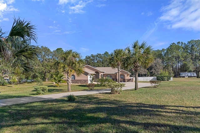 view of front of home with a front yard