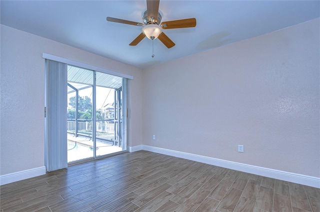 unfurnished room with ceiling fan