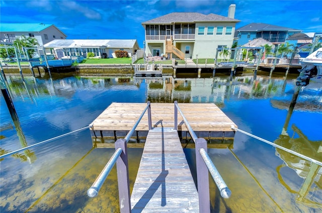 view of dock with a water view