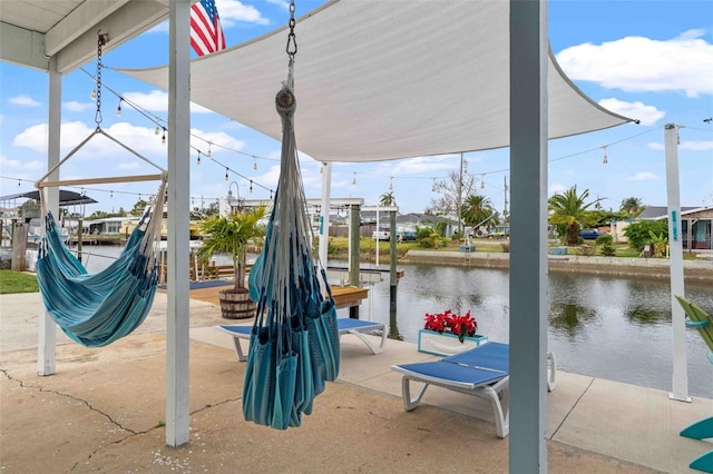 view of jungle gym with a dock and a water view