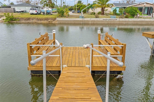 view of dock with a water view