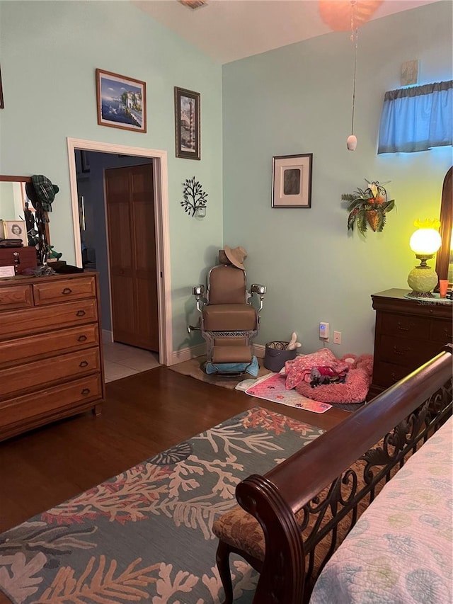 bedroom featuring hardwood / wood-style flooring