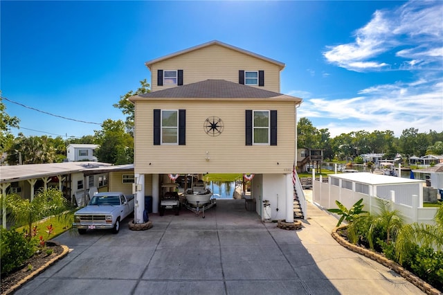 view of front of property with a carport