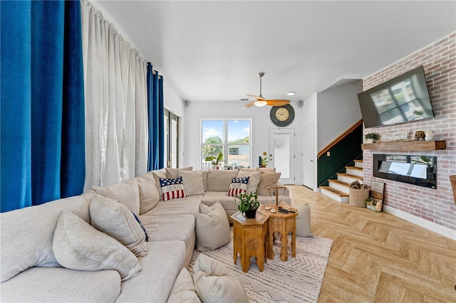 living room with light parquet floors and ceiling fan