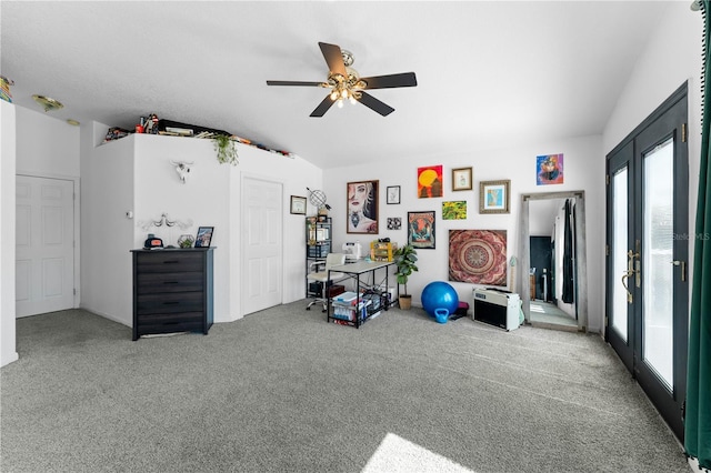 exercise room with light carpet, french doors, ceiling fan, and lofted ceiling